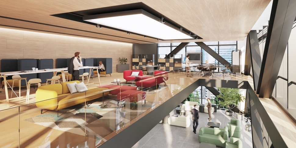 Große Glasfronten lassen viel Tageslicht herein und machen das Großraumbüro freundlicher