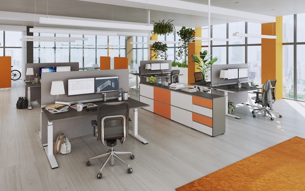 Einige Pflanzen, textile Elemente und farbliche Akzente: Schon mit wenigen Handgriffen lässt sich biophiles Design in jedem Büro umsetzen.